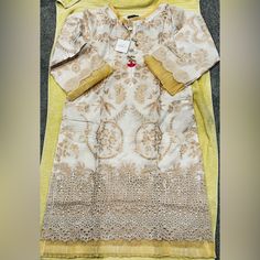 Pakistani 3 Piece Beautiful Dress Elegant Sleeveless Summer Kurta, Elegant Sleeveless Kurta For Spring, White Dress For Eid Festivities, White Dress For Festive Eid Occasion, Beige Long Sleeve Lawn Suit For Spring, White Fitted Elegant Kurta, White Chikankari Embroidered Lawn Suit For Party, White Fitted Lawn Suit For Formal Occasions, White Sleeveless Wedding Kurta