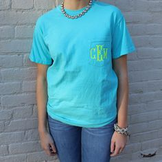 "*MAIN PHOTO: Model Size 2, wearing Small Berry, font 14, in white** You are not going to want to take this super soft monogrammed tee off! Large range of colors to choose from which are sure to brighten up any outfit. So easy to throw on and look great, take your jeans and t-shirt outfit up a notch! Look put together running errands, going to sporting events, or just lounging. Packs great, making it a vacation favorite. The t-shirt is 100% cotton that is pre-shrunk. Ribbed collar with set-in sl Casual Monogram Cotton Tops, Casual Cotton Monogram Tops, Blue Monogram Cotton Tops, Short Sleeve Cotton Monogram Top, Short Sleeve Cotton Top With Monogram, Short Sleeve Cotton Tops With Monogram, Monogrammed Short Sleeve Cotton T-shirt, Bridesmaids Shirts, Monogram Pocket Tees