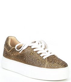 From Blue by Betsey Johnson, the Sidny Rhinestone Embellished Platform Lace-Up Sneakers feature:Synthetic upper with allover rhinestone embellishmentsLace-up closureSynthetic liningRubber outsoleApprox. 1" platform heightImported. Gold Sneakers With Rhinestones And Round Toe, Gold Rhinestone Sneakers With Round Toe, Gold Embellished Party Sneakers, Embellished Gold Sneakers With Round Toe, Gold Embellished Sneakers With Round Toe, Gold Embellished Round Toe Sneakers, Glamorous Embellished Lace-up Sneakers, Sporty Low-top Rhinestone Sneakers, Betty Johnson Rhinestone Boots