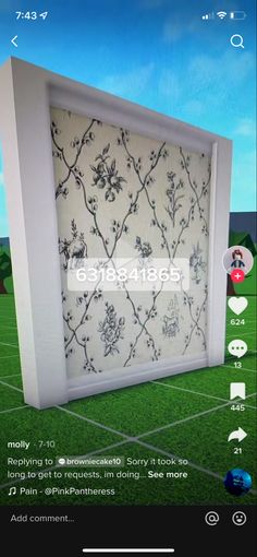 the screen is showing an image of a wallpapered area with flowers and vines on it