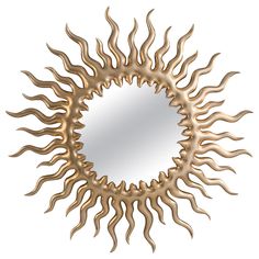 a mirror that is shaped like a sun