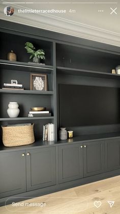 an entertainment center with built in bookshelves and shelves