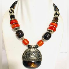 These Beautiful Himalayan Necklaces Having Unique Design Necklace Will Be A Perfect Touch To Your Outfit N Clothes. Handmade Black Necklace For Festivals, Handmade Black Necklaces For Festivals, Handmade Amber Jewelry For Festivals, Bohemian Round Orange Necklace, Traditional Brown Nickel-free Jewelry, Bohemian Orange Necklace, Bohemian Orange Round Necklace, Artisan Black Jewelry For Festivals, Amber Jewelry For Festivals And Gifts