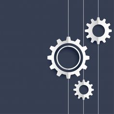 two gears hanging from strings on a blue background