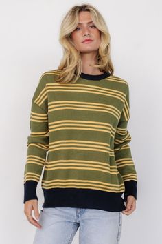 Olive green base with yellow stripes and black accents Knit material has stretch High round neckline Ribbing at neckline, sleeve cuffs, and hem Easy fit 50% Rayon, 28% Nylon, 22% Polyester Skye is 5'9, cup size 32A, size 0 and wearing size XS Green Striped Sweater, Baltic Born, Yellow Stripes, Black Accents, Cup Size, Striped Sweater, Knitting Materials, Green Stripes, Stripe Sweater