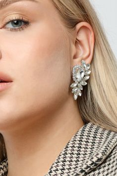 You deserve to be a princess for your day. ⬇️ Shipping takes; 2-4 days to USA 1-3 days to EU 2-5 days to rest of the world.  PRODUCT DESCRIPTION👇 These Jewelry Furtek earrings are the epitome of fashion and style. Their combination of crystal stone and rhinestone creates a stunning look that is both trendy and elegant. The crystal stone sparkles in the light, adding a touch of sophistication to your outfit. The rhinestones are strategically placed to enhance the overall design, creating a piece of jewelry that is sure to turn heads. Whether you're attending a formal event or just running errands, these earrings are the perfect accessory to add some cool to your look. Not only are they fashionable, but they are also very comfortable to wear. The stretchy design means that they will fit com Silver Cubic Zirconia Earrings For Glamorous Events, Silver Drop Earrings For Glamorous Events, Silver Rhinestone Earrings For Glamorous Events, Silver Earrings With Rhinestones For Glamorous Events, Glamorous Crystal Embellished Earrings For Anniversary, Silver Sparkling Earrings For Glamorous Events, Sparkling Silver Earrings For Glamorous Events, Crystal Rhinestone Earrings For Anniversary, Glamorous Crystal Earrings For Anniversary