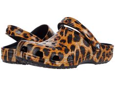 Crocs Classic Animal Print Clog - Shoes : Leopard : Crocs comfort Iconic Level 1. You will be wildly comfortable in the posh Crocs Classic Animal Print Clog. Thermoplastic (EVA) foam construction makes them incredibly light. Easy slip-on with adjustable back strap. Extra roomy for a comfortable fit. Ventilation system that allows air and water to pass through multiple ports inside of shoe. Iconic Crocs Comfort: original foam cushioned footbed. Thermoplastic (EVA) outsole. Imported. Measurements: Leopard Crocs, Crocs Clogs, Clog Shoes, Down On The Farm, Ventilation System, Clothes Shopping, Clogs Shoes, Eva Foam, Shiny Hair