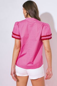 A solid woven top featuring china collar, V neckline with button down and double layered short sleeve with lace trim "Indulge in effortless style with our Learn As You Go woven top. The intricate china collar and V neckline with button down add a touch of sophistication, while the double layered short sleeves with delicate lace trim give a feminine twist. Perfect for learning and living in luxury." Details:Self : 100% CottonSize & Fit- Model is 5`8" And Wearing Size Small- Measurements Taken Fro Living In Luxury, Luxury Details, Layered Short, Skirt Jumpsuit, Resort Collection, Woven Top, Swim Accessories, Trim Detail