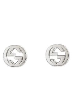 The iconic interlocking-G logo is outlined in texture on stud earrings that complete your look with Italian elegance and shine. Style Name:Gucci Silver Interlocking-G Stud Earrings. Style Number: 5536899. Available in stores. Gucci Earrings, Buy My Clothes, Jewel Frames, How To Look Expensive, Gold Diamond Hoop Earrings, Italian Elegance, Gold Topaz, Lana Jewelry, Strap Sandals Women