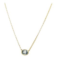 This beautiful pendant rubover setting is set with a 0.75ct oval shaped Aquamarine gemstone. The gem is set in an 18ct Yellow Gold frame, suspended on 16" 18ct Yellow Gold chain. Additional Information: Total Aquamarine Weight: 0.75ct Total Weight: 1.9g Pendant Size: 7.85mm x 6mm Chain Length: 16" SMS8384 Oval Gemstone Birthstone Necklace For Formal Occasions, Oval Gemstone Solitaire Necklace For Anniversary, Formal Oval Gemstone Solitaire Necklace, Fine Jewelry Oval Gemstone Solitaire Necklace, Oval Solitaire Necklace In Yellow Gold, Oval Yellow Gold Birthstone Necklace, Yellow Gold Chain, Aquamarine Gemstone, Oval Stone