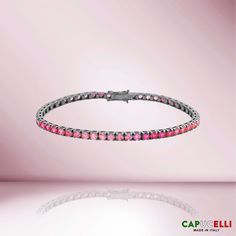 Beautiful Sapphire Tennis Bracelet. A staple in your jewelry collection. Handmade in Italy. This tennis Bracelet showcases a delicate box chain embellished with dozens of shimmering Pink Sapphires. Quality to us is important and that is why we hand select our diamonds for premium quality. ≫ Round Pink Shaded Sapphires : ◈ Carats: 11.50 ct. Carat (For 7 Inches Bracelet, other length will vary) ◈ 3.10mm Diameter *** Please consider 5% inaccuracies to the final product Luxury Pink Diamond Bracelet As Gift, Pink Sapphire Bracelet As A Gift, Elegant Pink Sapphire Bracelets, Luxury Pink Sapphire Bracelets, Luxury Pink Diamond Jubilee Bracelet, Luxury Pink Tennis Bracelet Gift, Luxury Pink Gemstone Tennis Bracelet, Formal Pink Gemstone Tennis Bracelet, Luxury Pink Tennis Bracelet