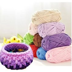 several balls of yarn sitting next to each other