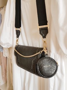 "Cotton woven and leather belt, adjustable, with mini purse made of black embossed leather. The belt bag can be detached with a gold carabiner. All metal elements in gold. The strap fits all our bags. Dimensions: length 92-140 cm / 36,2\"-55,1\" width 4 cm / 1,5\" bag diameter 9 cm /3,5\" SHIPPING FREEshipping wordwild - Express shipping UPS 3-4 Business days (please send us your hone number for the courier) Have a look at my other sections in my shop at the main menu: https://www.etsy.com/shop/ Luxury Bags With Key Leash For Everyday Use, Black Bags With Leather Strap, Crossbody Bag With Key Leash, Black Bucket, Leather Bucket, Leather Bucket Bag, Leather Mules, Mini Purse, Purse Strap