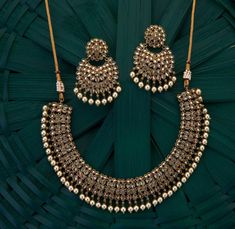 ZohraArts Gold Plated Indian Jewelry Polki Choker Set with Necklace and Earrings. Indian Bridal Traditional Jewelry Sets. Elegant Indian Necklace With Antique gold Gold Plating. Indian Bridal polki Traditional One Gram Jewelry Choker Set. Gorgeous 24 K gold plated. This immaculate and dainty jewelry set will surely make a statement on your special day! Boasting this wedding jewelry set is the ultimate statement piece that has the look of fine polki. *Necklace Fitting is adjustable *Earrings Clos Vintage Gold Kundan Necklace For Wedding, Antique Gold Bridal Necklace For Wedding And Festivals, Antique Gold Bridal Necklace For Wedding, Antique Gold Kundan Necklace For Wedding, Traditional Antique Gold Bridal Necklace For Wedding, Festive Antique Hand Set Necklace, Vintage Kundan Necklace For Festive Celebrations, Vintage Gold Meenakari Necklace, Vintage Chandbali Necklaces For Wedding