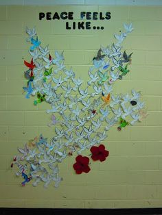 a bulletin board with flowers and words on it