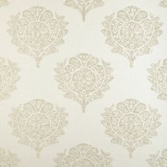 a white and beige wallpaper with an ornate design