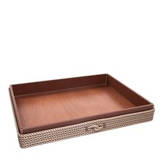 a brown tray with handles and wicker trimmings on the bottom, sitting on a white surface