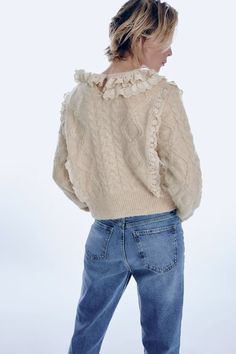 F00153698-104 Casual Cream Sweater With Ruffles, Long Sleeve Sweater With Ruffles For Fall, Crew Neck Ruffle Sweater For Layering, Ruffled Long Sleeve Knit Sweater, Casual Long Sleeve Ruffle Cardigan, Knit Ruffle Crew Neck Sweater, Knit Crew Neck Sweater With Ruffles, Crew Neck Knit Sweater With Ruffles, Ruffled Crew Neck Knit Sweater