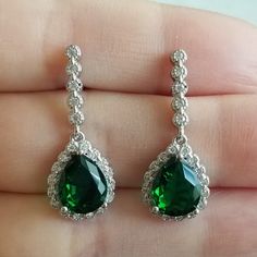 New 925 Silver Filled Pear Cut Emerald Diamond Dangle Drop Earrings For Women All Gemstones Are Simulated. Size Approx 1" Measurements Shown In The Pictures. A Jewelry Box Included. Ready To Ship Same Day. Feel Free To Ask Any Question. All Photos Are Real Time From Actual Object No Stock Photo Used. Color Might Be Slightly Different Due To Lighting. Elegant 925 Stamped Drop Earrings, Formal Teardrop Earrings Stamped 925, Elegant Drop Earrings Stamped 925, Sterling Silver Pear-shaped Teardrop Earrings For Formal Events, Sterling Silver Pear-shaped Bridal Earrings For Anniversary, Sterling Silver Long Drop Teardrop Earrings For Formal Occasions, Pear-shaped Sterling Silver Bridal Earrings For Anniversary, Silver Pear-shaped Bridal Earrings As Gift, Silver Pear-shaped Bridal Earrings For Gift