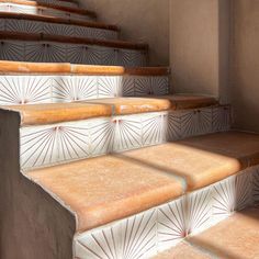 an image of some steps that are going up to the sky in this photo and it looks like they have been made out of ceramic tiles