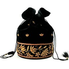 "Look your best wearing this luxurious black velvet pouch bag, exquisitely embroidered with glittery antiqued silver metallic threads and genuine semi precious stones. It is certain to bring you compliments. Perfect for an Indian wedding or for having fun around town! Expertly hand embroidered by third generation master zardozi artisans. Of heirloom quality. - 9\" x 6\" with useable interior space 6\" x 6 \". - Rigid bottom and 2\" base, so bag sits nicely. - Wrist cord with tassel, 6 in. drop p Luxury Gift Bucket Bag Shaped As A Pouch, Traditional Potli Bag For Evening, Bollywood Style Festive Potli Bag For Evening, Bollywood Style Embroidered Evening Potli Bag, Traditional Evening Potli Bag, Traditional Gold Embroidery Potli Bag, Bollywood Style Festive Evening Potli Bag, Festive Bollywood Evening Potli Bag, Luxury Embroidered Potli Bag For Festive Occasions