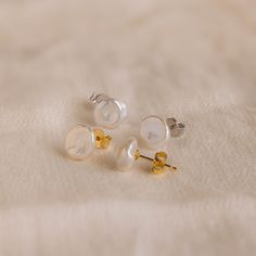 Exquisite in simplicity, our Freshwater Pearl Studs add a touch of refined charm to any occasion. Ideal for formal events or as a heartfelt Mother's Day surprise, these pearl earrings exude timeless elegance for every moment 🤍✨ SKU: RR-ER472 Product Details Material: High Quality Solid 925 Sterling Silver Finish: 18K Gold ∙ Sterling Silver Featuring Freshwater Pearl Stud Earrings, Pearls ranging from ~9-11mm Sold as a Pair Featured Styles Part of our Pearl Collection Model showcases an elegant, Timeless Pearl Earrings As Gift, Refined Round Pearl Earrings As Gift, Refined Round Pearl Earrings For Gift, Minimalist Hypoallergenic Pearl Earrings For Formal Occasions, Elegant Pearl White Everyday Earrings, Elegant Pearl Button Earrings For Wedding, Refined White Pearl Earrings As A Gift, Refined White Pearl Earrings For Gift, Timeless White Earrings For Anniversary