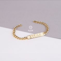 ABOUT PRODUCT  This 14K Gold ID Chain Cuban Link Bracelet is suitable gift for girlfriend, mom and her. You can even buy as a birthday gift for your friends or anniversary gifts, If you want to add a special note we can write for you and put to inside of package. We manufacture our jewelry pieces with carefully and after production we double checking in quality control department. Our main idea is keep our items for daily wearing especially for minimalist jewelry pieces. You can wear this chain bracelet in your daily activities. It's shining enough to effect to other people and perfect fitting on wrist. It will be perfect layering jewelry on your wrist. 14K Gold ID Bracelet, Cuban Link Nameplate Bracelet, Custom Initial Engraved Bar, Custom Name Bracelet, Personalized Gift For Her Him, Uni Luxury Gold Name Bracelets, Luxury Gold Bracelet With Name, Gold Nameplate Chain Bracelet, Luxury Nameplate Bracelet As A Gift, Elegant Name Bracelets With Rectangular Shape, Luxury Name Bracelets For Gift, Elegant Rectangular Bracelets With Name Detail, Elegant Rectangular Name Bracelets, Luxury Personalized Bracelets For Gift