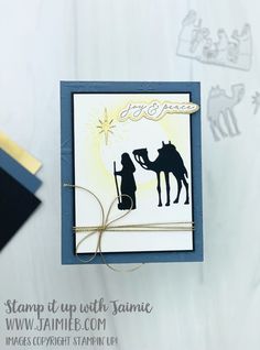 a handmade christmas card with a nativity scene on it and a star in the sky