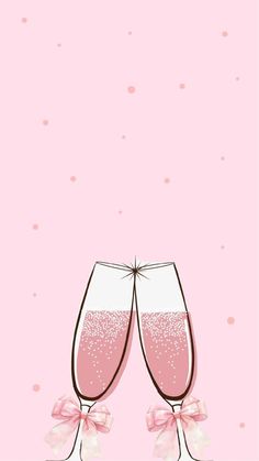 two champagne glasses with pink bows on the bottom and one is filled with bubbles, while the