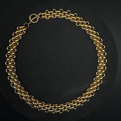 Introducing the Chokehold Necklace, a bold statement piece that stands out with its thick, 18k gold plated choker design. Elevate your look with this elegant and eye-catching accessory. Material: 18k gold plated 14+2 inch Gold Chunky Chain Link Choker, Elegant Link Choker With Chunky Chain, Gold Chunky Chain Choker, Classic Gold Choker With Adjustable Chain, Yellow Gold Plated Choker With Gold Chain, Formal Gold Chain Choker Necklace, Gold Link Chain Choker, Yellow Gold Metal Choker Chain Necklace, Yellow Gold Chunky Chain Choker