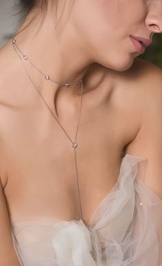 Silver layered bridal necklaces for your big day Luxury Silver Long Drop Backdrop Necklace, Affordable Elegant Bridal Necklace For Party, Affordable White Bridal Necklace For Party, Luxury Silver Backdrop Necklace For Wedding, Luxury Delicate White Bridal Necklace, Luxury Minimalist Choker For Formal Events, V Necklace Bridal, Luxury Delicate Chain Necklace For Engagement, Luxury Delicate Chain Necklace For Wedding