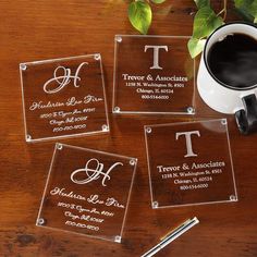 personalized glass coasters with monogrammed names on them and a cup of coffee