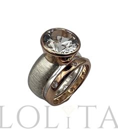 This is ring set from two rings! The wider ring:  large white topaz 12mm in diameter set in  14k solid gold bezel, sterling silver ring band is 8mm wide and has light texture, weight about 8g Second ring: Ring is made from 14k solid gold,  width 3mm, weight about 3.5g , with moissanites 2mm in diameter each (8 pieces). Rings will be packed in a beautiful gift box - ready for giving! *PLEASE NOTE-  We offer standard free shipping worldwide (You will receive your order within 7 - 21 business days) White Topaz Rings With Bezel Setting For Anniversary, White Topaz Anniversary Ring With Bezel Setting, Anniversary White Topaz Ring With Bezel Setting, Elegant Topaz Ring With Tension Setting, Elegant Topaz Rings With Tension Setting, Modern White Topaz Ring For Anniversary, Modern Topaz Ring With Bezel Setting, White Gold Bezel Set White Topaz Ring, Modern Topaz Ring With Diamond Bezel Setting