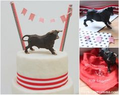 there is a cake with a bull on top and other decorations in the back ground