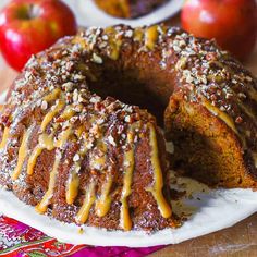 a cake with icing and nuts on it