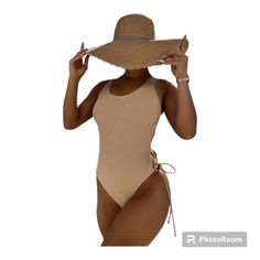 Ashley Marie Boutique Women's Khaki One Piece Swimsuit Summer Cut Out High Waisted Bathing Suit Lace Up Swim Swimsuit Size: Small (4) Medium (6) Large(8/10) X-Large (12) Please See Photos For More Details And Measurements Tote: 9 Chic Sleeveless Bodysuit For Sunbathing, Trendy Sleeveless Bodysuit For Sunbathing, Fitted Casual Bodysuit For Sunbathing, Chic One-piece Bodysuit For Vacation, Fitted Beige Bodysuit For Poolside, Chic Bodysuit For Spring Sunbathing, Chic Spring Bodysuit For Sunbathing, Chic Bodysuit With Lined Body For Vacation, Beige Beachwear Bodysuit For Summer