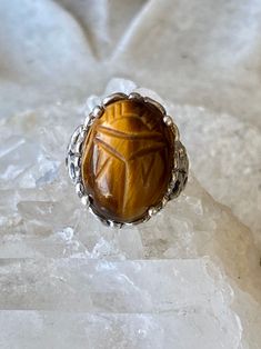 Art Deco Egyptian Revival Carved Tigers Eye Scarab Sterling Silver Vintage Ring ring size 6 Symbolic Carved Round Ring, Handmade Oval Rings For Collectors, Artisan Carved Rings, Spiritual Oval Gemstone Engraved Ring, Spiritual Oval Engraved Gemstone Ring, Spiritual Oval Engraved Ring With Gemstone, Symbolic Oval Gemstone Jewelry, Handmade Oval Ring For Collectors, Spiritual Carved Round Ring