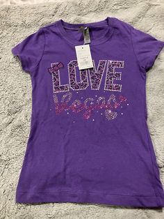 Girls Purple Embellished Tee/ Las Vegas/ Rhinestones /XS NWT. Condition is New with tags. Shipped with USPS Ground Advantage. Purple Y2k Shirt, Cheap Y2k Purple Tops, Purple Y2k Style Graphic T-shirt, Purple Y2k Graphic Print T-shirt, Mcbling Outfits, 2000 Rinestone Shirt, Mcbling Fashion, Vintage Tee Shirts, 2000s Clothes