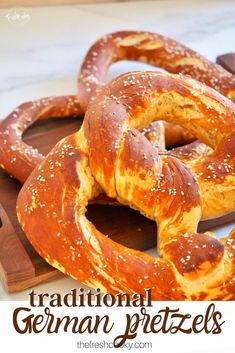 traditional german pretzels on a cutting board with text overlay reading traditional german pretzels