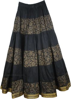 Black Cotton Festive Long Skirt - This is a quality cotton crinkle long skirt with golden brocade-lace work and a henna style floral rendition in hand block print. The flowing skirt is half lined to give it a full voluminous look and it features a stretchable elastic waistband for a flexible fit. A gorgeous golden ribbon encircles the hemline which gives the skirt a festive look. This skirt surely looks beautiful as it highlights the contrast in woodsmoke black and golden (see detailed picture b Festive Black Skirt, Traditional Black Flowy Skirt, Traditional Black Skirt For Festive Season, Traditional Black Skirt For Festive Occasions, Traditional Black Cotton Skirt, Traditional Black Lined Skirt, Tall Skirt, Henna Style, Wedding Skirt