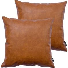 two brown pillows sitting next to each other