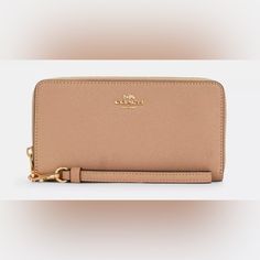 Coach Long Zip Around Wallet In Gold/Taupe New With Detached Tags Chic Beige Travel Wallet, Classic Beige Wallets With Interior Card Slots, Classic Beige Wallets With Gold-tone Hardware, Beige Clutch With Interior Card Slots, Travel Wallets With Gold-tone Hardware, Classic Beige Wallets For Everyday Use, Classic Beige Wallet For Everyday Use, Beige Leather Wallet With Zipper Closure, Luxury Beige Wallet For Everyday Use