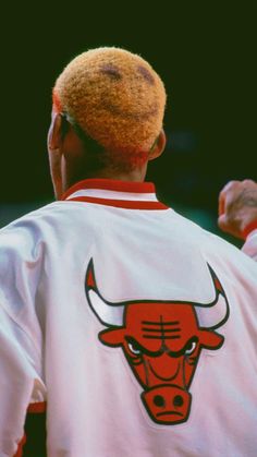 the back of a chicago bulls player wearing a white jersey