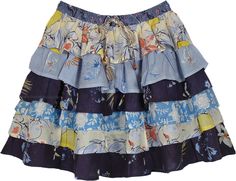 A cute floral cotton short skirt with six ruffled layers in summer shades of blue color in prints.  This bouncy bohemian short skirt is an ideal outfit choice for hot summer weather. #tlb #TieredSkirt #vacationclothing #beachwrap #Floral #Printed #bohemianfashion #ColorfulShortSkirt #BeachSkirt #RuffledSkirt Shades Of Blue Color, Christmas Pic, Blue Shades Colors, Short Summer Skirts, Layers Short, Summer Blues, Beach Floral, Summer Shades, Pretty Skirts