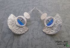 "Handmade Silver Art Deco Earrings made of sterling silver and blue enamel. The dangle earrings are inspired by art deco with geometric shapes and modern texture on its base. Modernist and contemporary, these femenine sterling silver earrings you can wear everyday. Details: Weight: 2.3 g each one Width: 22mm = 0.87\" Height: 35mm = 1.38\" Enjoy and thank you for looking! Follow me www.facebook.com/jewelersoul Visit my shop for a matching more pendants: https://www.etsy.com/es/shop/JewelerSoul?se Blue Fusion Earrings For Pierced Ears, Modern Blue Metal Earrings, Blue Contemporary Earrings As Gift, Contemporary Blue Earrings For Gift, Modern Blue Sterling Silver Earrings, Contemporary Blue Jewelry For Gifts, Contemporary Blue Sterling Silver Jewelry, Blue Artistic Design Drop Earrings, Blue Enamel Earrings With Artistic Design