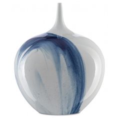 a blue and white vase sitting on top of a table