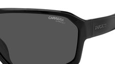 Carrera Ducati sunglasses model CarDuc 020/S color code 807 IR Black. Refined materials and alluring lines define these full-coverage Carrera | Ducati sunglasses, made of ultem for durability, flexibility, and best-in-class comfort under a helmet. The new air duct detail on the temples was inspired by motorcycle fairings, accompanied by Carrera and Ducati logos. Lens options include polarised and ultrapolar versions, designed for sharp vision even while on the road. Modern Matte Black Shield Sunglasses For Protection, Matte Black Modern Shield Sunglasses For Protection, Functional Black Wayfarer Sunglasses, Functional Black Sunglasses With Uv Protection, Black Functional Sunglasses With Uv Protection, Black Polycarbonate Aviator Sunglasses With Uva Protection, Black Polycarbonate Polarized Shield Sunglasses, Black Polycarbonate Shield Sunglasses With Polarized Lenses, Black Aviator Sunglasses With Uva Protection