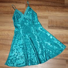 Gorgeous Size Small Deep Turquoise Chemise Nightie, Slip, Night Gown, Lingerie. Low V-Neckline Trimmed In Lace And Adjustable Spaghetti Straps. Pictures Say It Best! New Without Tags. 100% Polyester. Tons Of Other Name Brand Clothing And Decor Available Now As Well! Check Out My Closet To See All There Is Currently Available! Can Gladly Combine Shipping Up To 5lbs. Green V-neck Nightgown For Bedtime, Blue V-neck Slip Dress For Sleep, Green V-neck Sleepwear, Green Nightgown For Sleepover, Green V-neck Nightgown For Sleep, Green Summer Sleepwear For Wedding Night, Green Summer Wedding Night Sleepwear, Blue V-neck Nightgown For Pajama Party, Green Satin Sleepwear