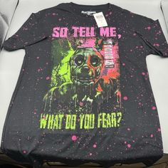 a t - shirt that says so tell me what do you fear?