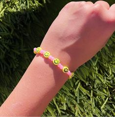 This smiley face Seed Beaded Bracelet is super trendy and is very high quality. It is made with pink seed beads, smily face beads, as well as PAXCOO elastic string. The perfect addition to your jewelry collection. Seed Bead Bracelets, Smiley Face, Beaded Bracelet, Smiley, Seed Beads, Jewelry Collection, Accessory Gift, Jewelry Bracelets, Roses